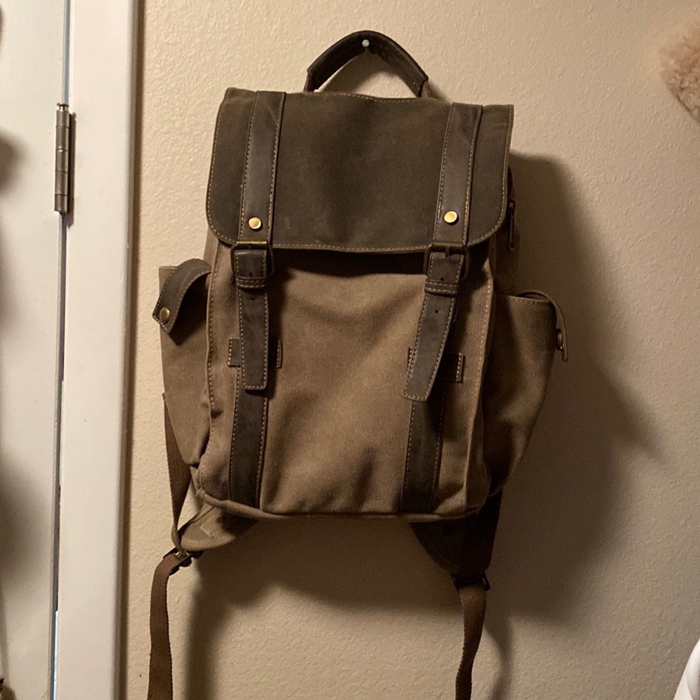 Unisex olive brown backpack.